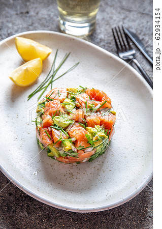 PERUVIAN FOOD. Salmon ceviche with avocado, spring 62934154
