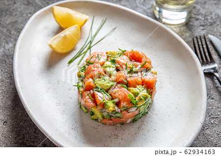 PERUVIAN FOOD. Salmon ceviche with avocado, spring 62934163