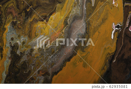 Abstract background of a mixing brown color paints with gold 62935081