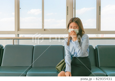 Sick asian girl working from hospital., sitting at Sick asian girl working from hospital., sitting at 62935431