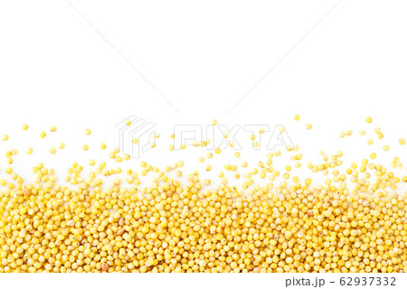 Millet scattered on a white, isolated. Millet 62937332