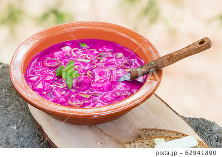 Cold traditional lithuanian vegetable summer soup with kefir and red beet 62941890