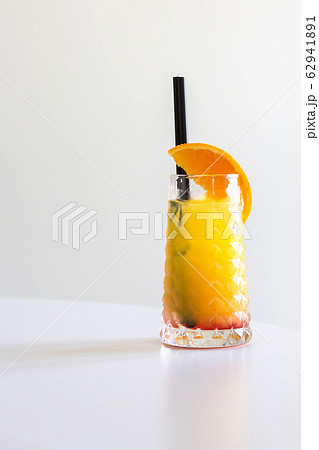 Tequila sunrise cocktail isolated on a gray background Tequila sunrise cocktail isolated on a gray background 62941891