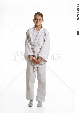 Funny and humble girl in a kimono, isolated on a 62943643