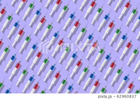 Health-care pattern from colorful vaccine's plastic syrenges. 62960837