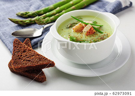Asparagus soup in white bowl 62973091