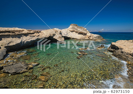 The beach of Agios Konstantinos in Milos, Greece The beach of Agios Konstantinos in Milos, Greece 62973150