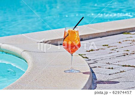 Wine Glass of cold cocktail Aperol spritz against 62974457