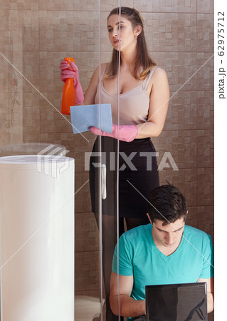White woman is tidied up in presence of boyfriend. 62975712