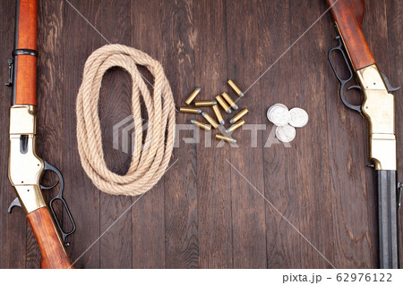 Wild west guns - lever-action repeating rifles 62976122