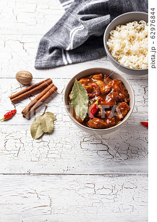 Curry chicken tikka masala with rice Curry chicken tikka masala with rice 62976844