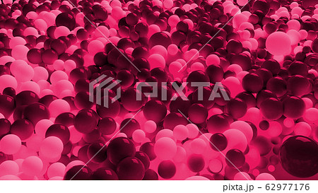 beautiful shiny red white balls of different colors and sizes completely cover surface. Some spheres glow. 3d photorealistic render geometric reative holiday background of shiny balls 62977176