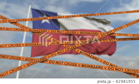 Caution biohazard tape with flag of Chile as a background. Chilean restricted entry or quarantine. Conceptual 3D rendering 62981955