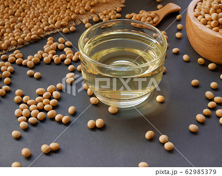Soybean oil and soybean on a black background 62985379