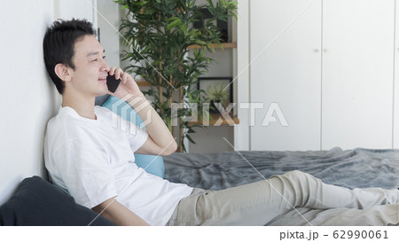 男性　スマートフォン 62990061