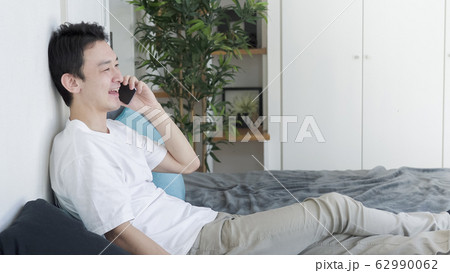 男性　スマートフォン 62990062