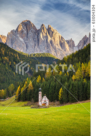 Church of St. Johann of Nepomuk with Odle Group in fall, South Tyrol, Italy 63004304