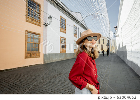 Woman traveling in the old town La Laguna on Tenerife island 63004652