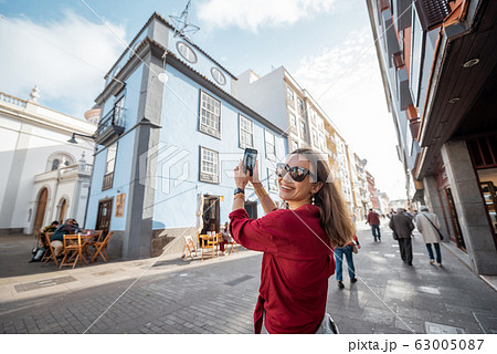 Woman traveling the old town in La Laguna city on Tenerife island, Spain 63005087
