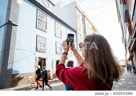 Woman traveling the old town in La Laguna city on Tenerife island, Spain 63005088