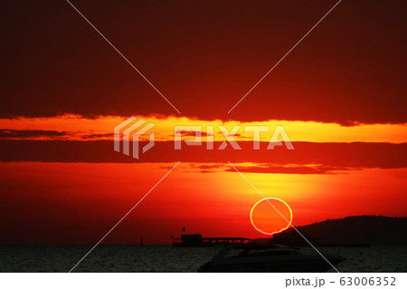 phenomenon of partial sun eclipse over silhouette 63006352