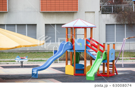 Colorful children playground in the city park Colorful children playground in the city park 63008074