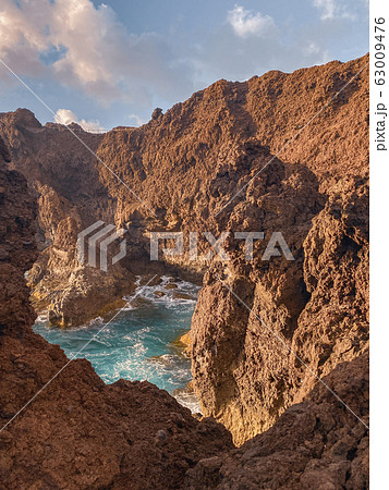 Steep precipice on rocky coast Steep precipice on rocky coast 63009476