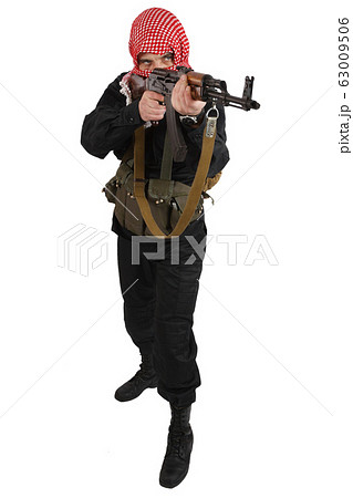 guerillas in black uniform with keffiyeh with AK 63009506