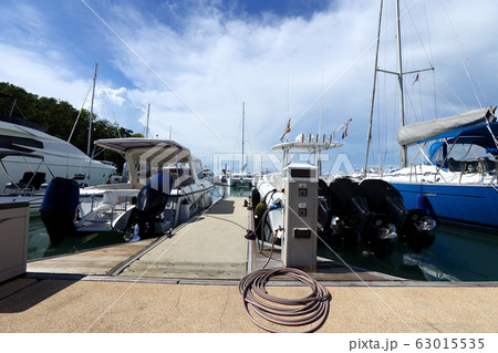 Luxury Yachts float on crystal clear sea in Marina Luxury Yachts float on crystal clear sea in Marina 63015535