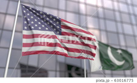 Waving flags of the USA and Pakistan near modern skyscraper. 3D rendering 63016775