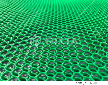 Background mesh hole plastic fiber that is green Background mesh hole plastic fiber that is green 63018980
