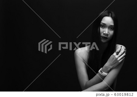 Portrait of beautiful nude long straight black 63019812