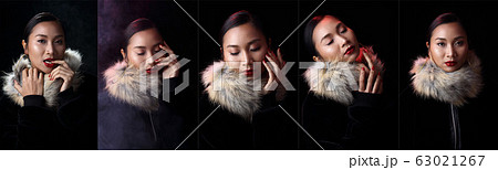 Red Glitter Lipstick on Asian beautiful woman with 63021267