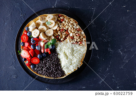 Thick indonesian pancake with a sweet filling Thick indonesian pancake with a sweet filling 63022759