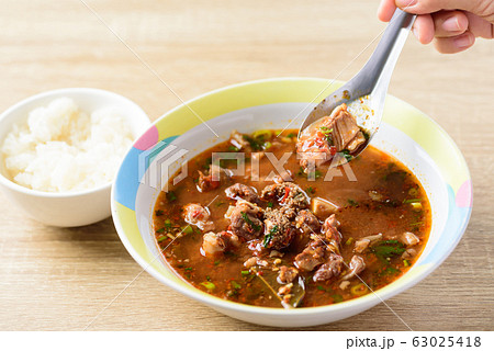 Spicy Thai curry soup with beef guts (Kaeng Om Nua), Northern Thai food 63025418