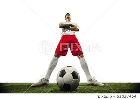 Football or soccer player on white background - motion, action, activity concept Football or soccer player on white background - motion, action, activity concept 63027464