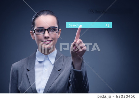 Search concept with businessman pressing button 63030450