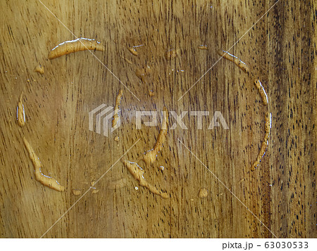 2 Trace water from cups on wood texture, Abstract background, sign concept, Close up and macro sho 2 Trace water from cups on wood texture, Abstract background, sign concept, Close up and macro sho 63030533