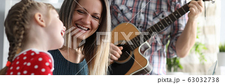 Happy parents with child Happy parents with child 63032738