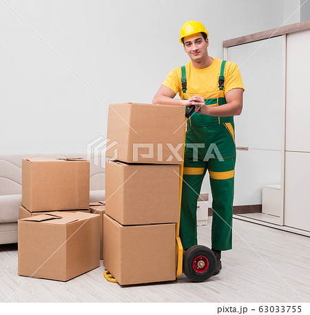 Man delivering boxes during house move 63033755