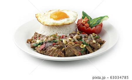 Stewed Pork Leg Stir fried with Thai Basil, Chili Stewed Pork Leg Stir fried with Thai Basil, Chili 63034785