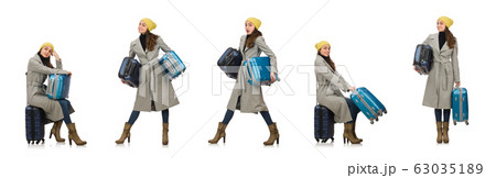 Woman with suitcase ready for winter vacation Woman with suitcase ready for winter vacation 63035189