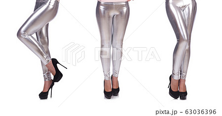 Woman legs with stockings on white Woman legs with stockings on white 63036396