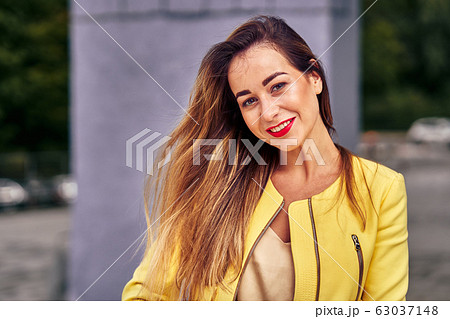 Portrait of a young beautiful laughing woman 63037148
