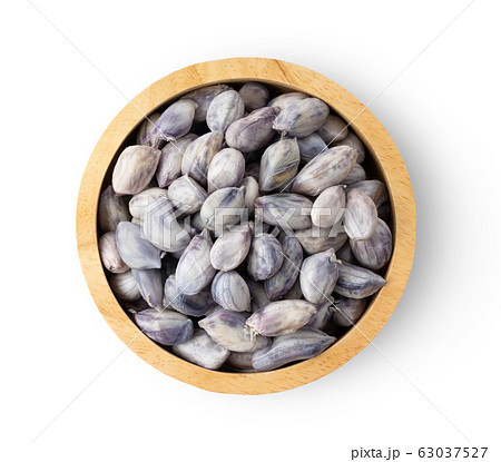 peanuts in wood bowl on white background 63037527