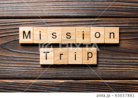 Mission Trip word written on wood block. Mission 63037881