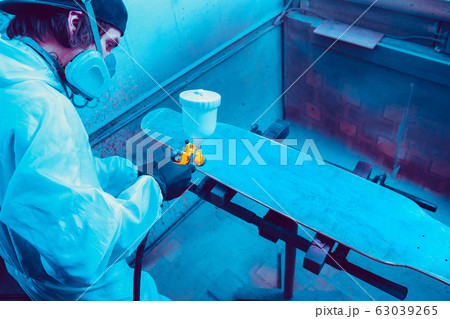Skater in process of making his own skateboard, longboard - open business concept Skater in process of making his own skateboard, longboard - open business concept 63039265