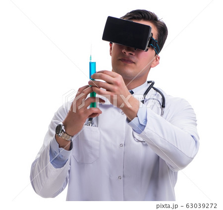 Doctor wearing a vr virtual reality headset isolated on white ba Doctor wearing a vr virtual reality headset isolated on white ba 63039272