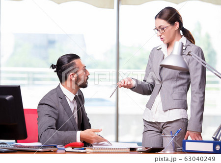 Woman and man in the business concept Woman and man in the business concept 63040249