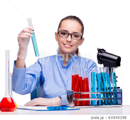 Lab chemist working with microscope and tubes 63040296